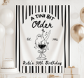 A Tini Bit Older Halloween birthday banner with ghost martini design for a personalized milestone birthday party