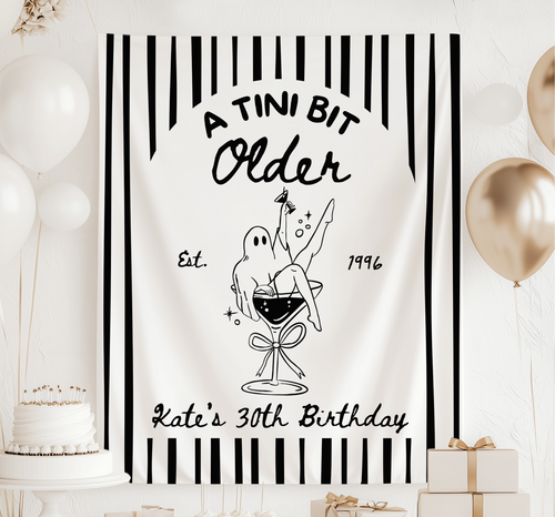 A Tini Bit Older Halloween birthday banner with ghost martini design for a personalized milestone birthday party