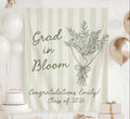 Personalized Grad in Bloom graduation banner with sage green stripes, floral bouquet, graduate name and Class of 2026