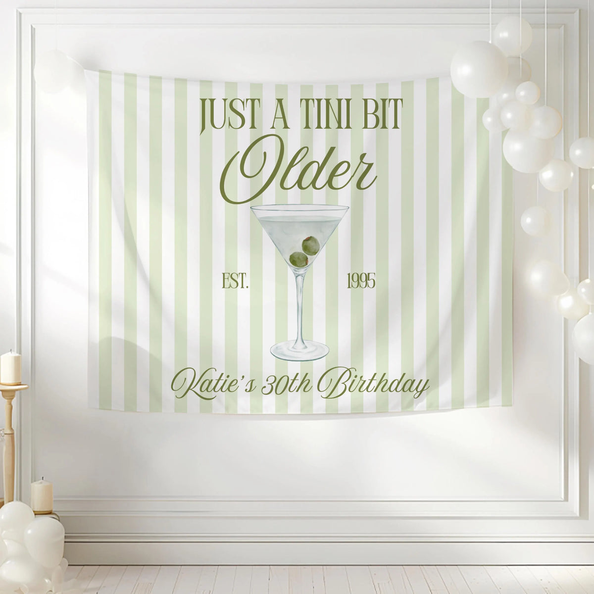 Elegant personalized birthday backdrop featuring a dirty martini