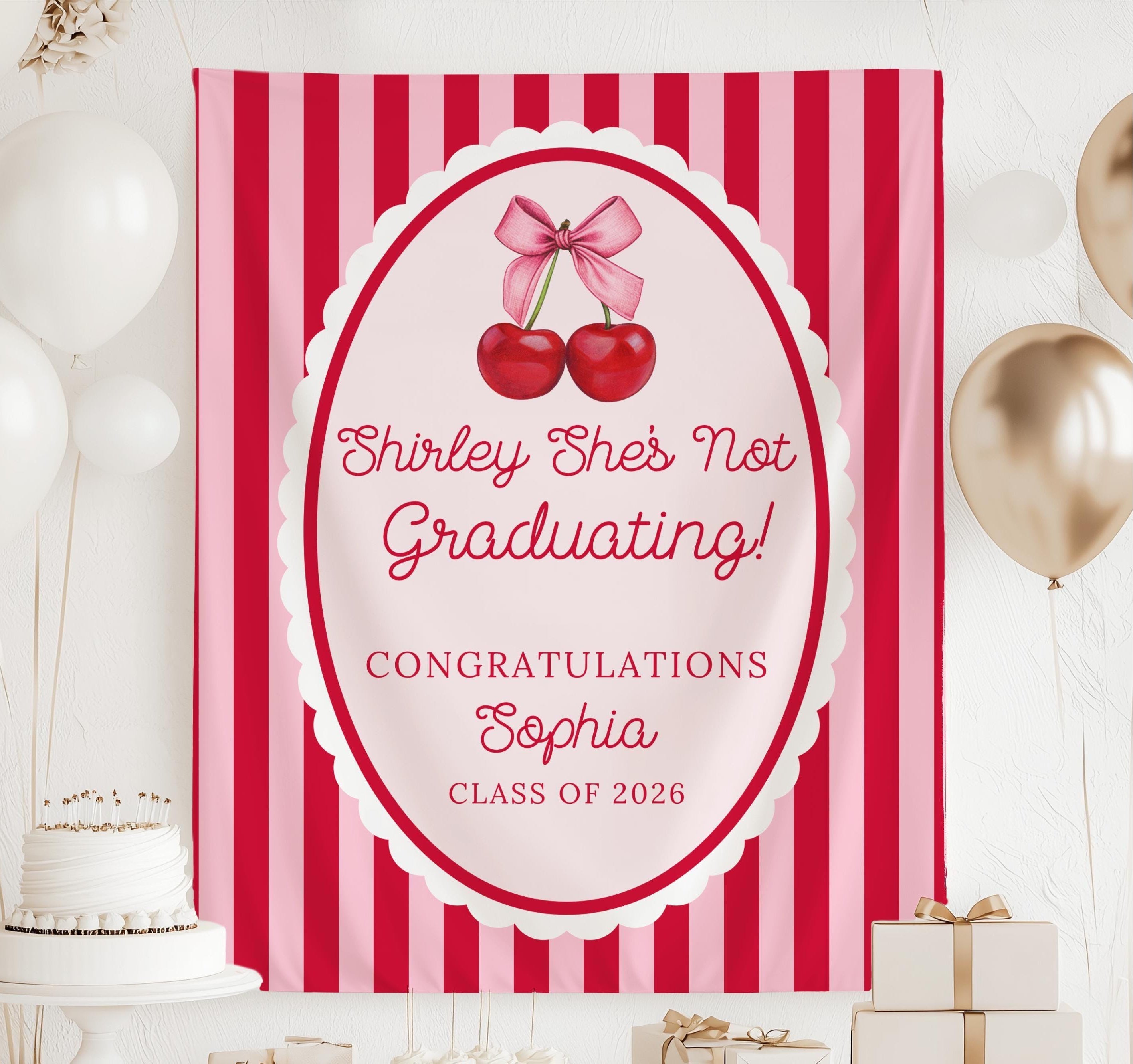 Shirley She’s Not Graduating personalized graduation banner with pink stripes, red cherries and bow