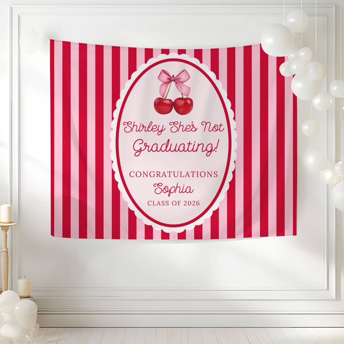 Shirley Temple themed graduation banner with cherries, pink and red stripes and personalized graduate name