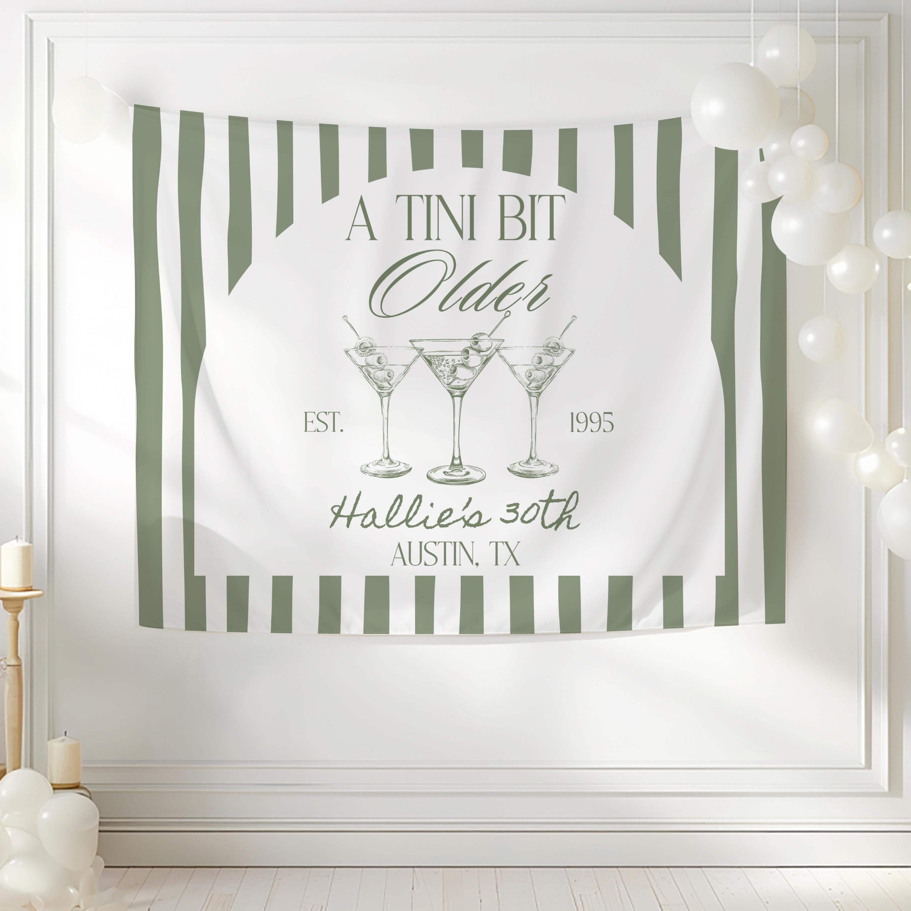 Cocktail themed birthday backdrop featuring elegant martini glasses and personalized birthday wording
