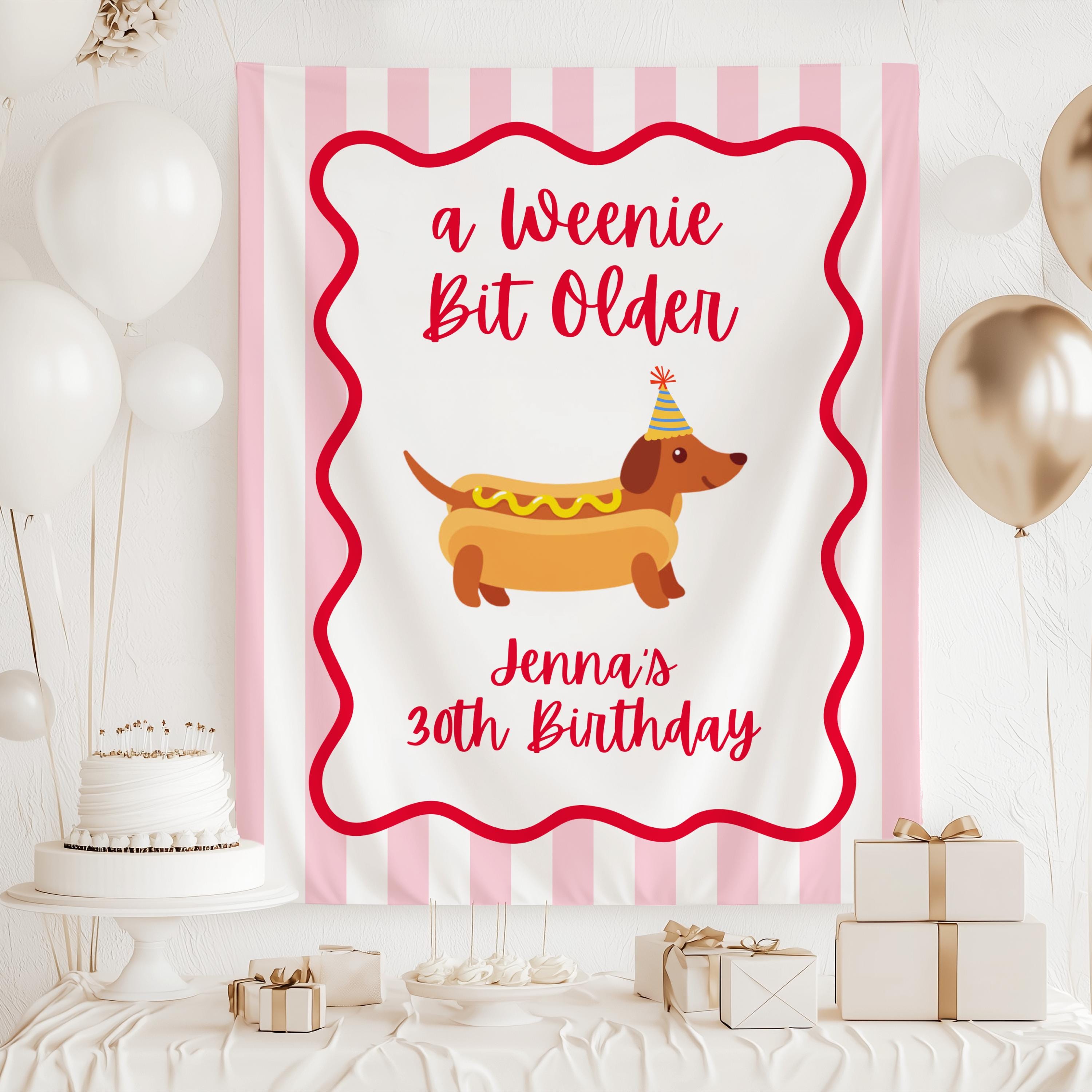 Funny birthday backdrop featuring a dachshund dressed as a hot dog with personalized event text

