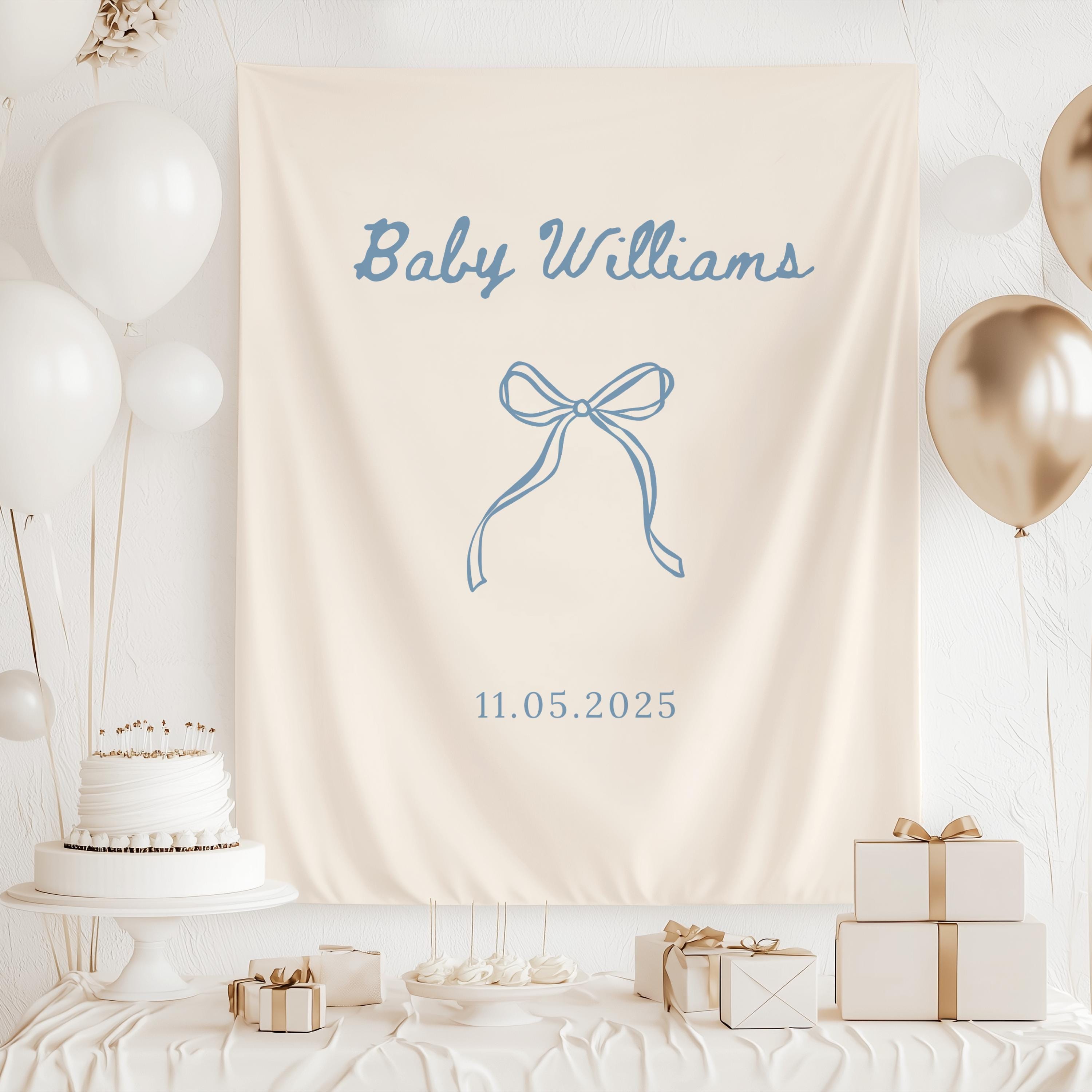 Custom baby name backdrop featuring a minimalist bow design for gender neutral, baby girl, or baby boy showers.