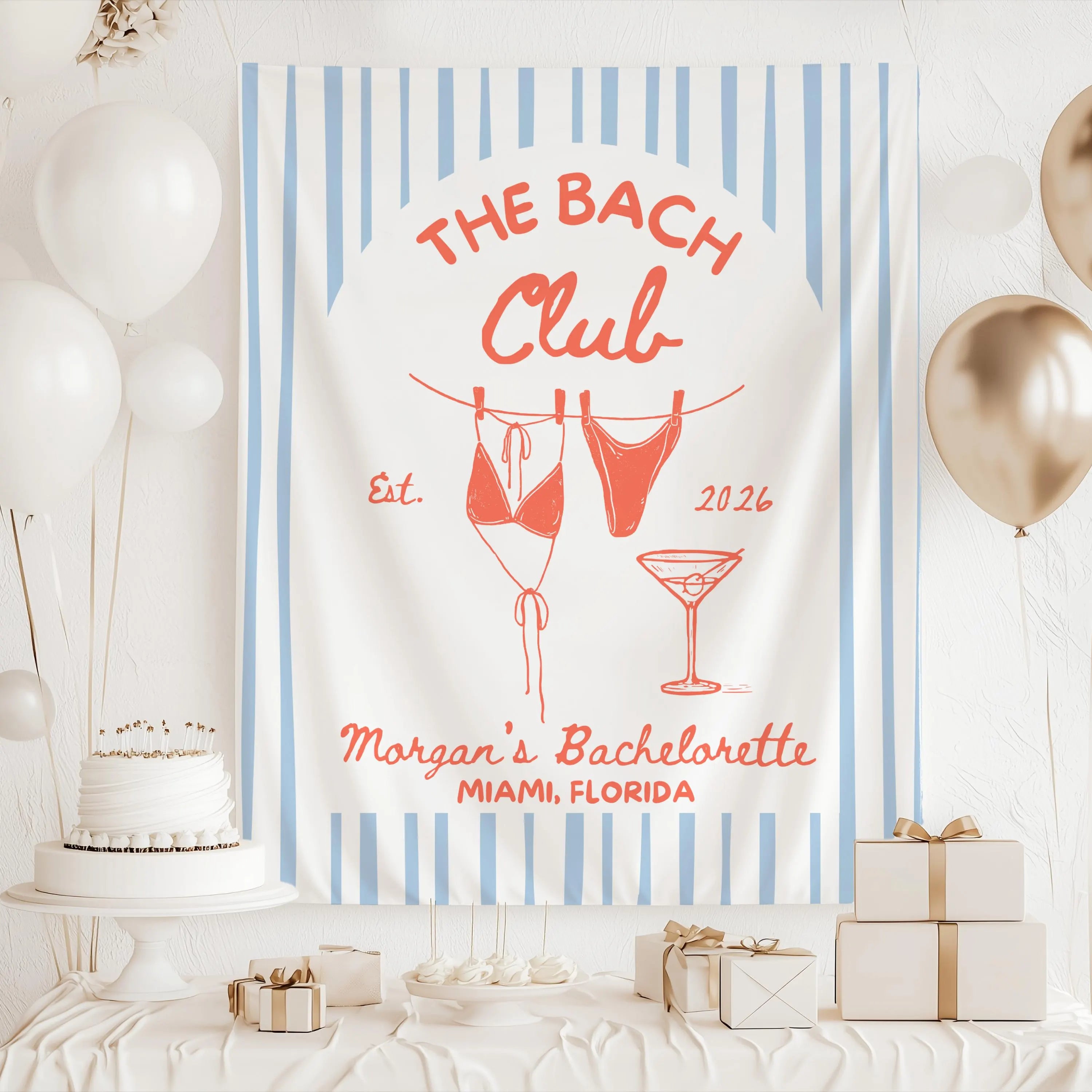 Beach bachelorette backdrop with hanging bikini clothesline, martini artwork and personalized destination details.