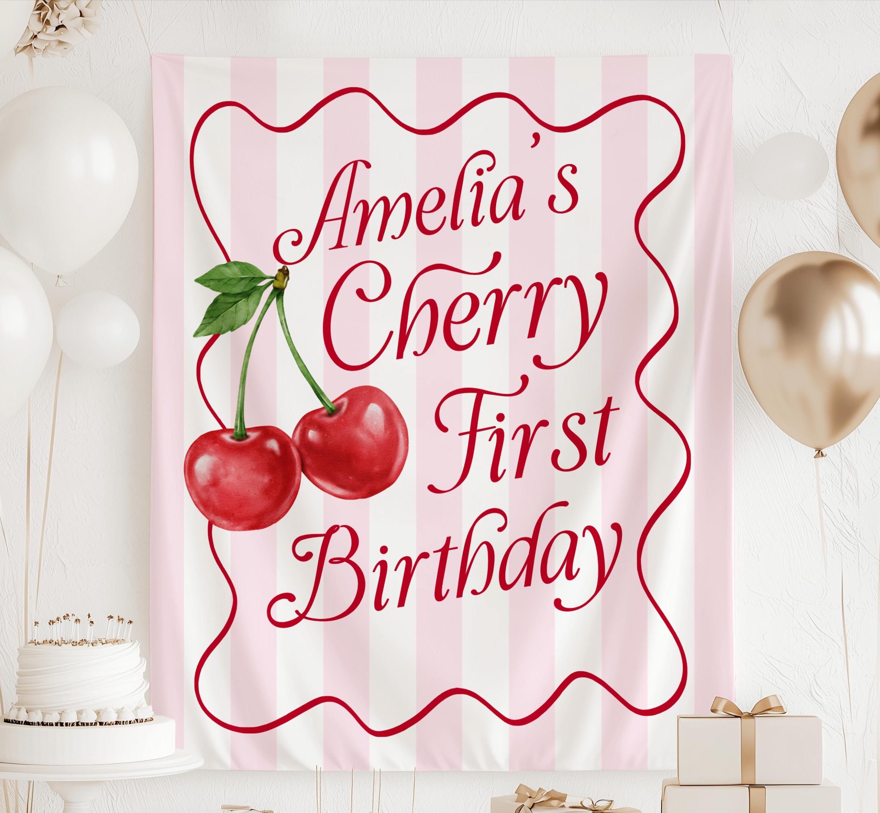 Personalized Cherry First Birthday banner with custom name and pink striped birthday backdrop