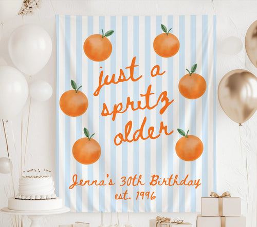 Personalized citrus birthday party decor banner featuring orange artwork and custom name for any age