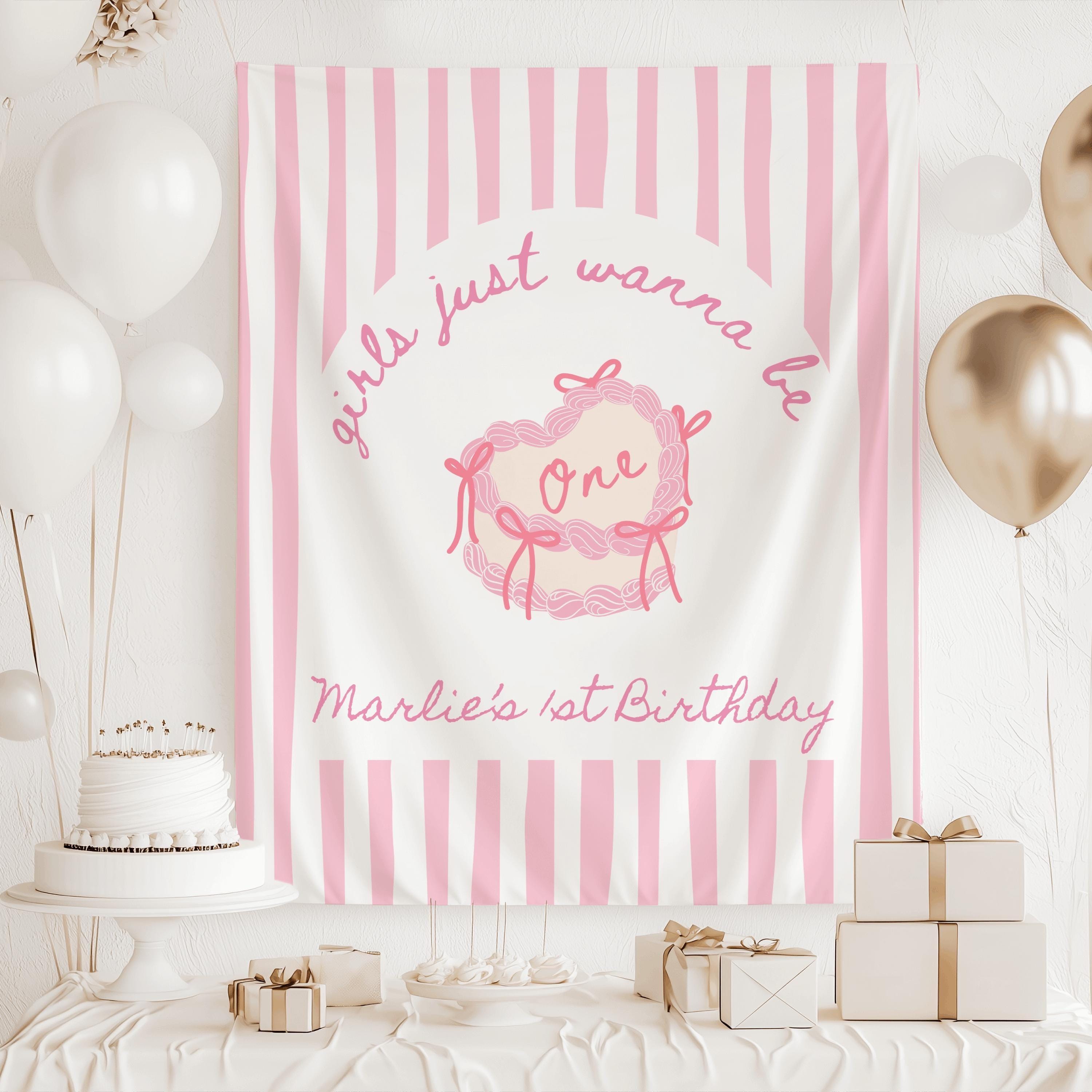 Custom coquette first birthday backdrop featuring pink bows and personalized party details
