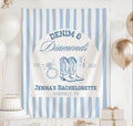 Personalized Denim & Diamonds bachelorette banner featuring cowboy boots, diamond ring illustration and blue striped backdrop for a western bridal celebration.