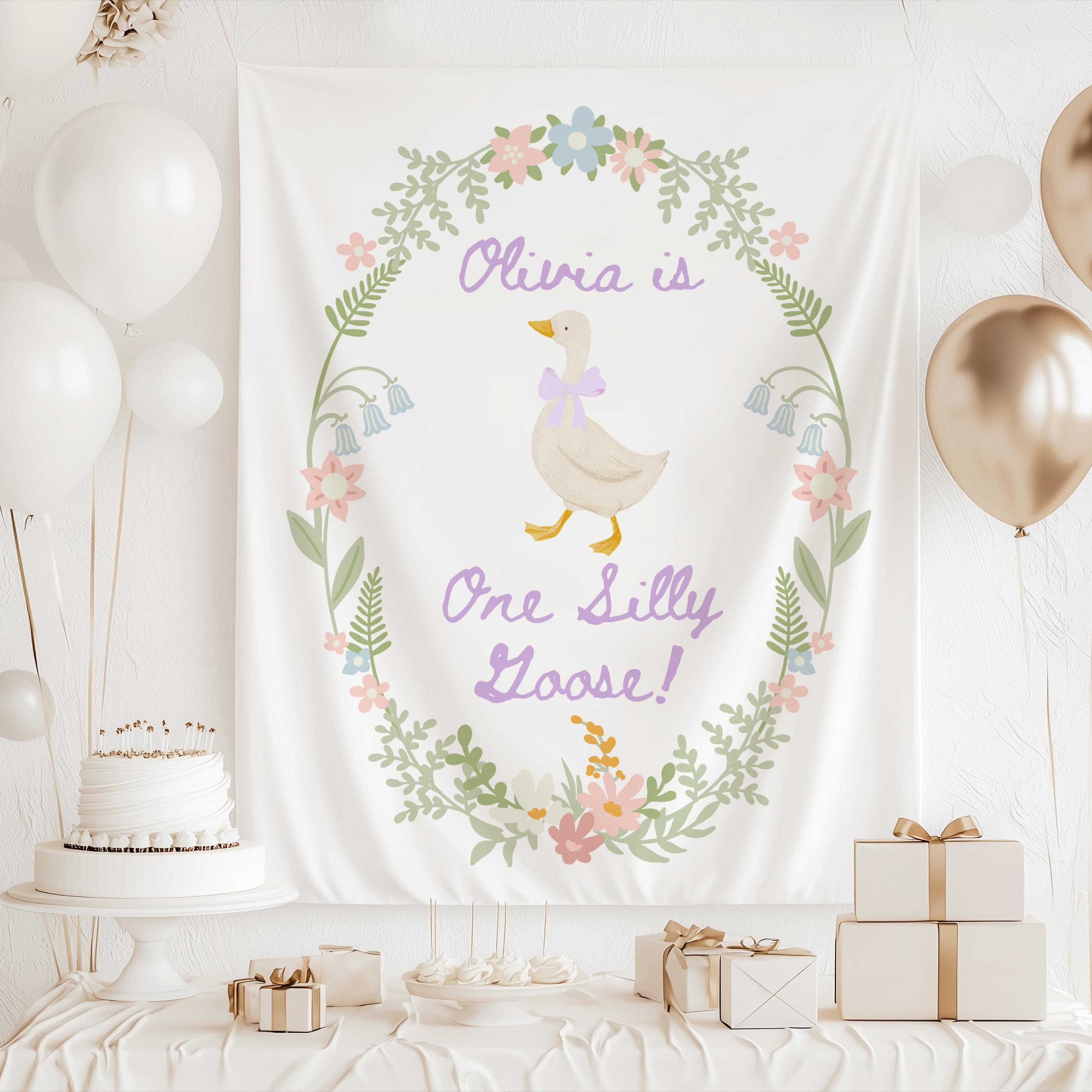 One Silly Goose birthday backdrop with floral wreath pink gingham and personalized name
