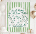 Funny pickle themed bachelorette backdrop with martini and pickle illustrations