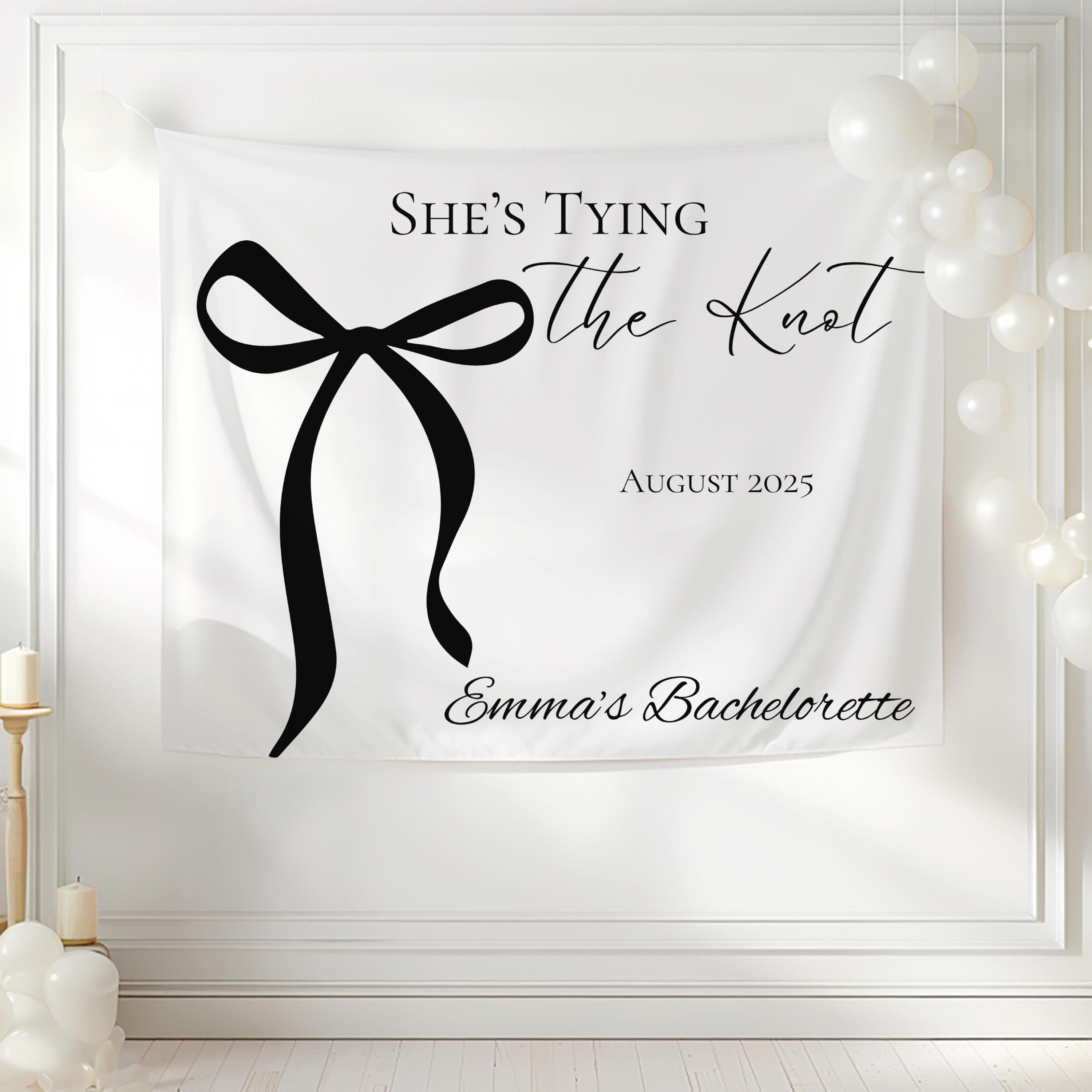 Personalized bridal shower photo backdrop with She's Tying the Knot theme and elegant bow illustration