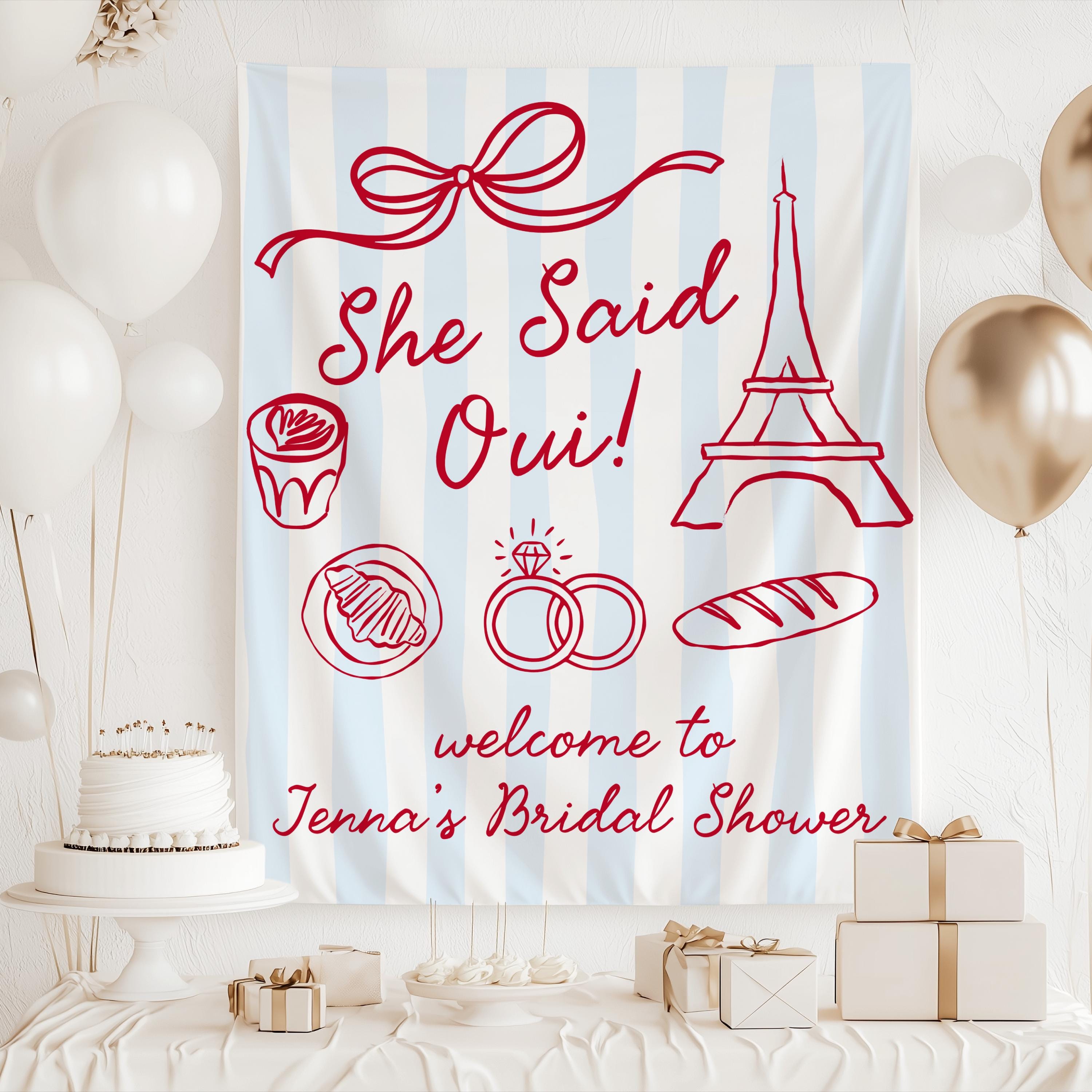 Custom Parisian wedding shower tapestry featuring She Said Oui design with French inspired artwork