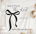 Personalized She's Tying the Knot bridal shower banner customized with the bride's name and event date