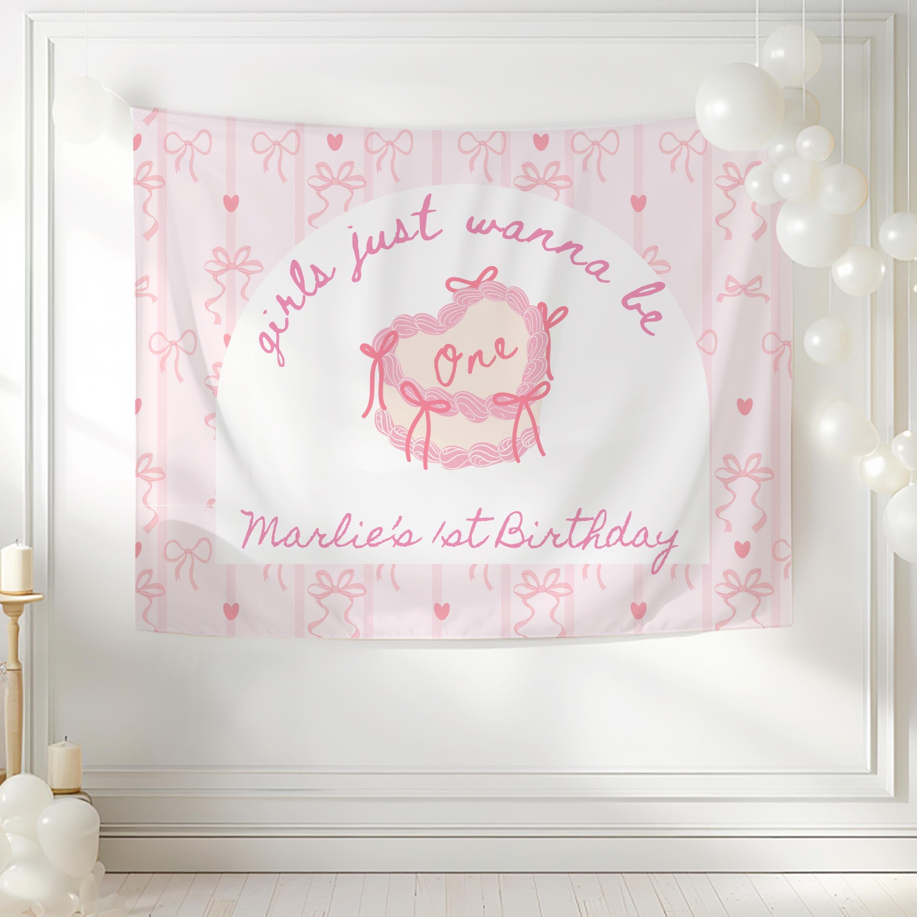 Custom pink bow birthday backdrop for cake table decorations and first birthday party photos