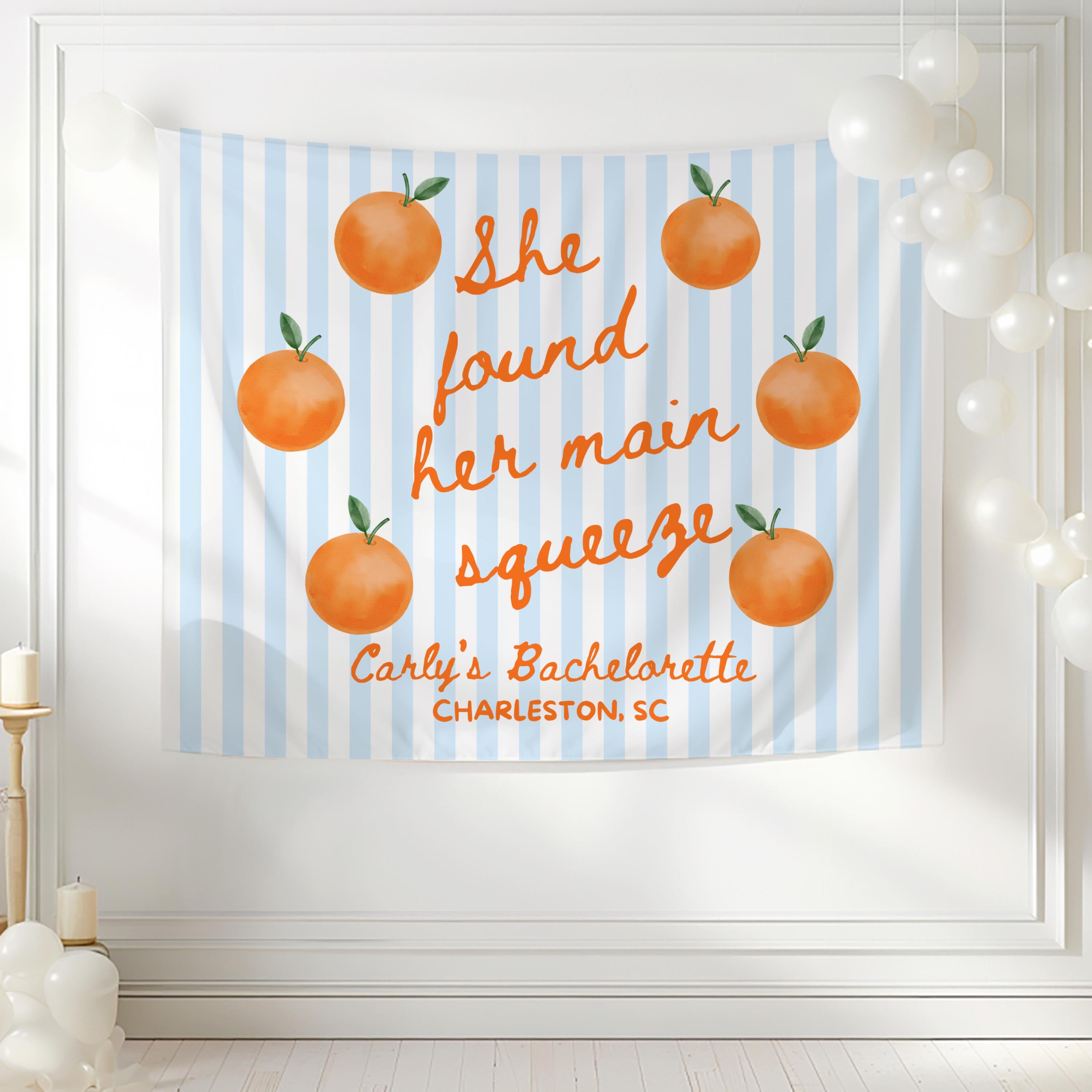 Orange citrus bridal shower banner featuring She Found Her Main Squeeze design with personalized details
