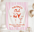 Personalized The Bach Club banner featuring hanging bikinis, martini illustration and striped beach bachelorette backdrop.