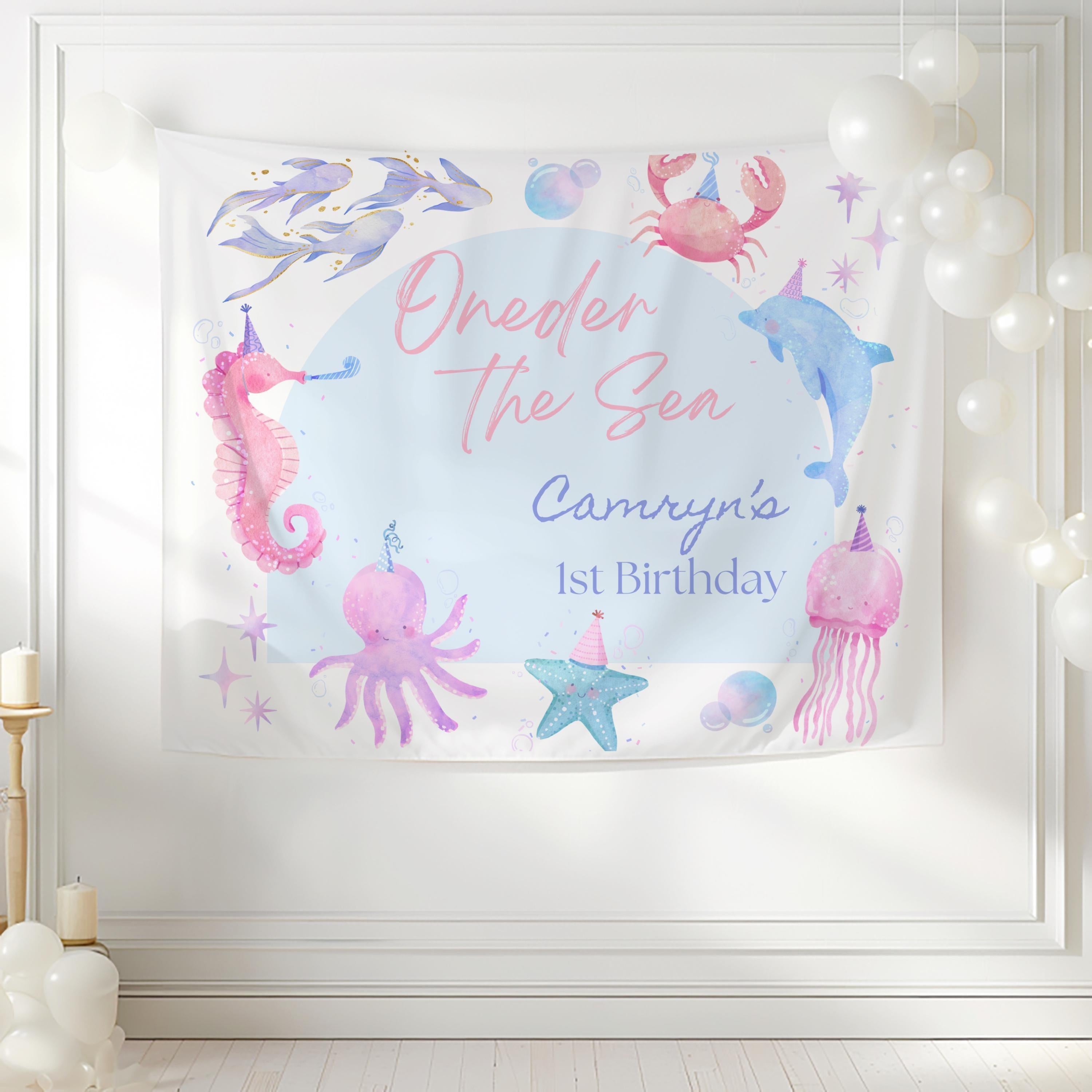 Custom under the sea first birthday backdrop featuring watercolor sea animals and personalized party details